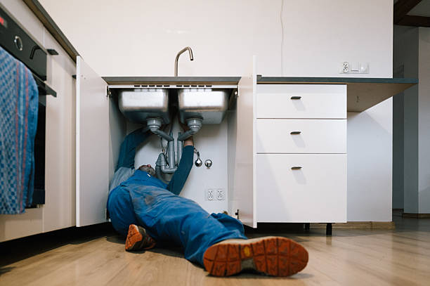 Professional Plumbing technician working in Ringsted, IA